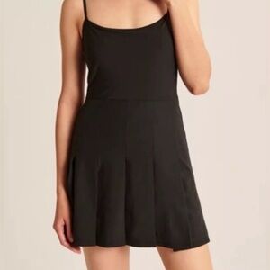 Abercrombie & Fitch Pleated Traveler Mini Dress in Onyx